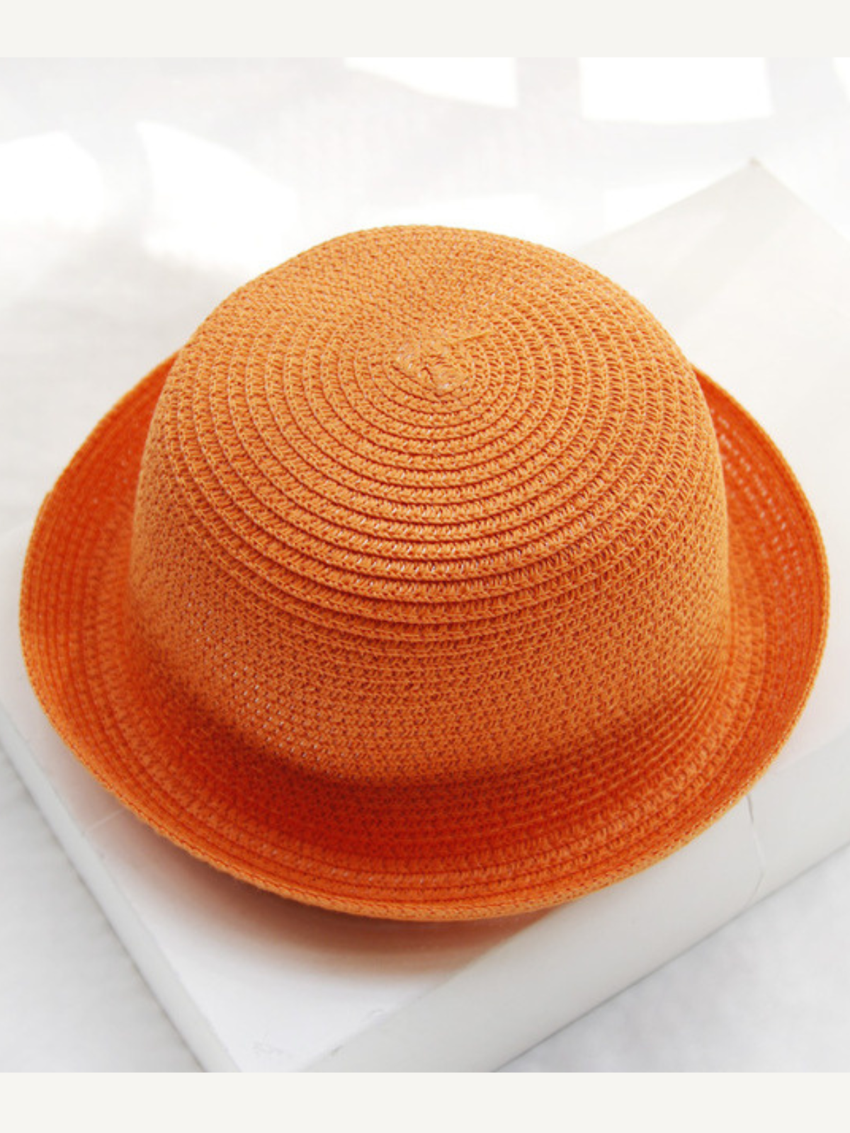 Runway-Ready Orange Bowler Hat
