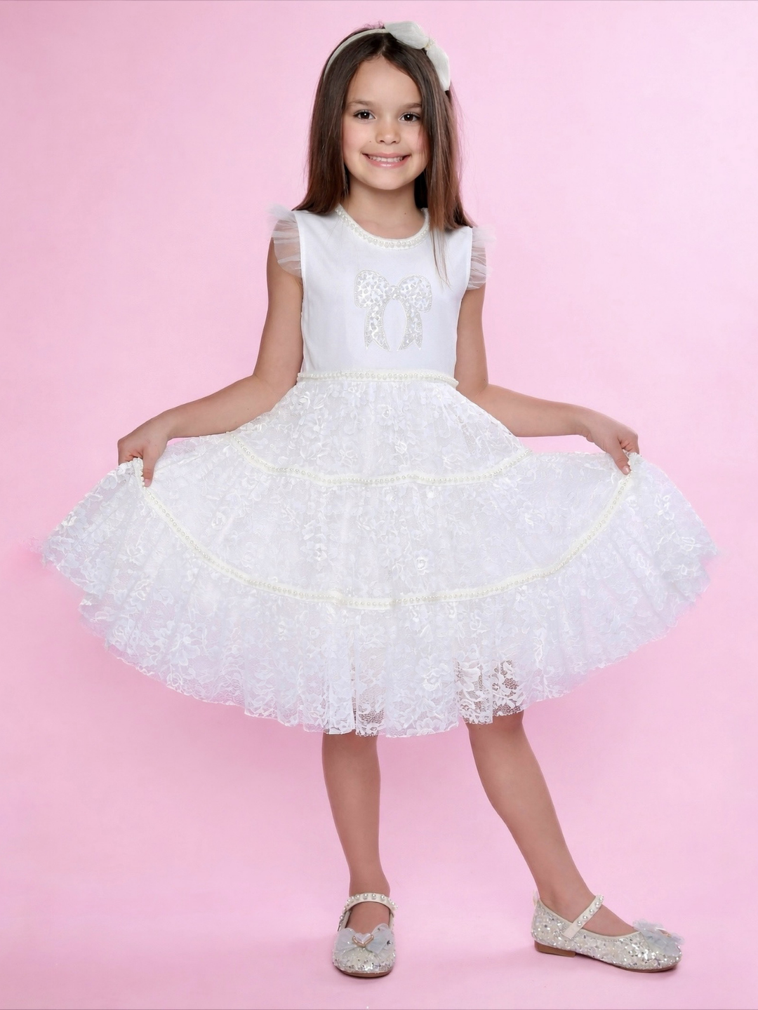 Ivory girls dress styled for weddings, parties, and special occasions