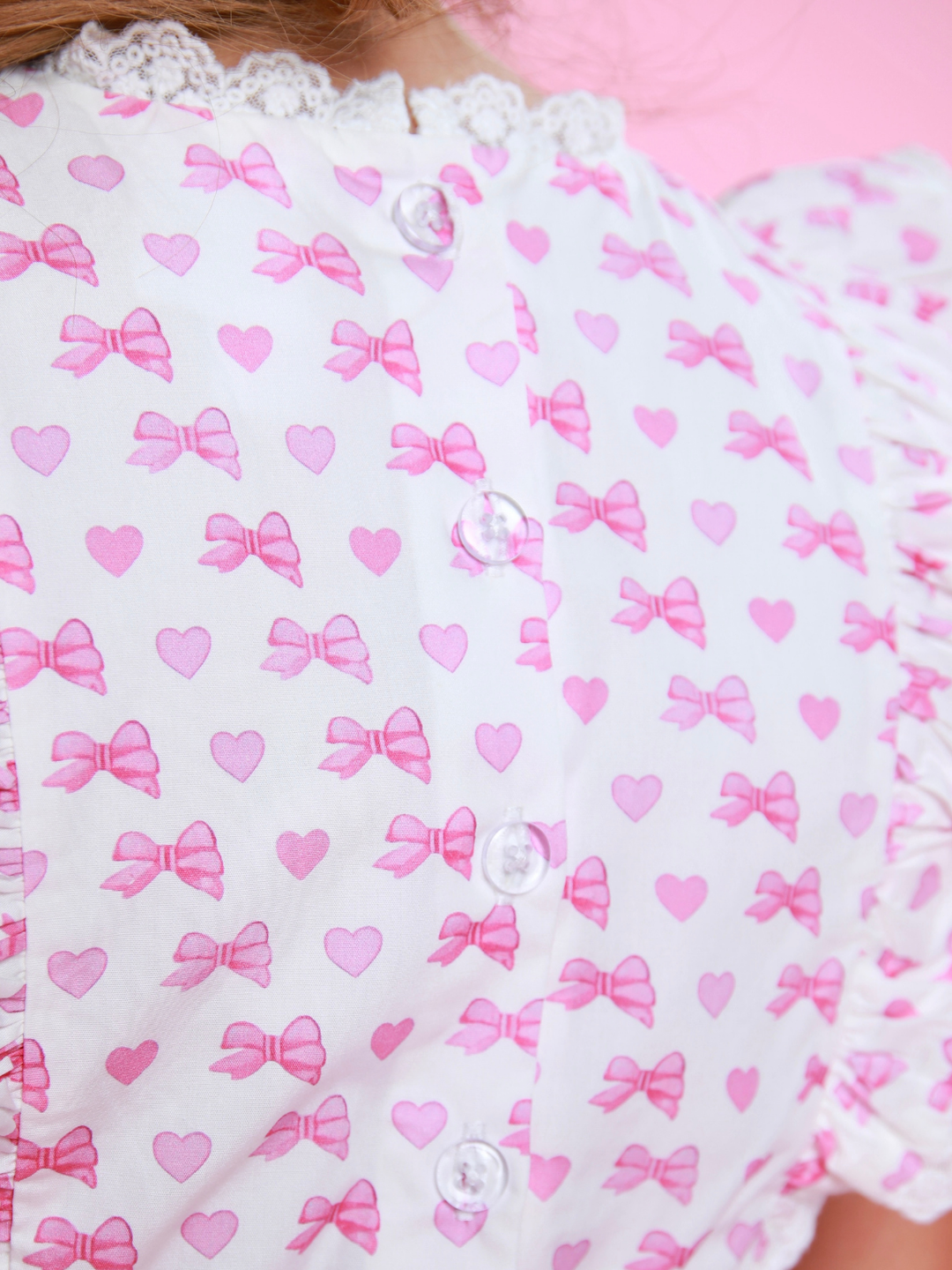 Back detail of girls dress with button closure