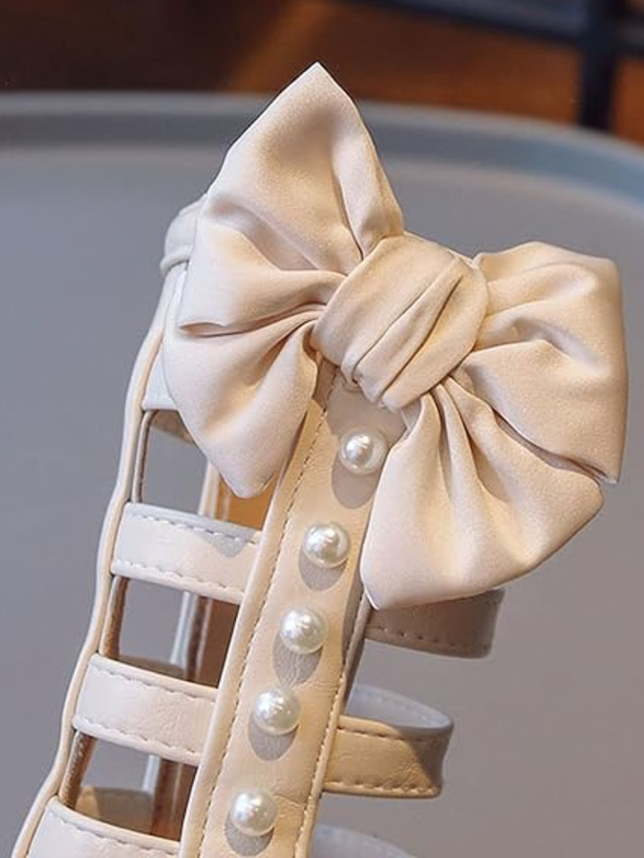 Bow-Embellished Pearl Gladiator Sandals By Liv and Mia Mia Belle Girls