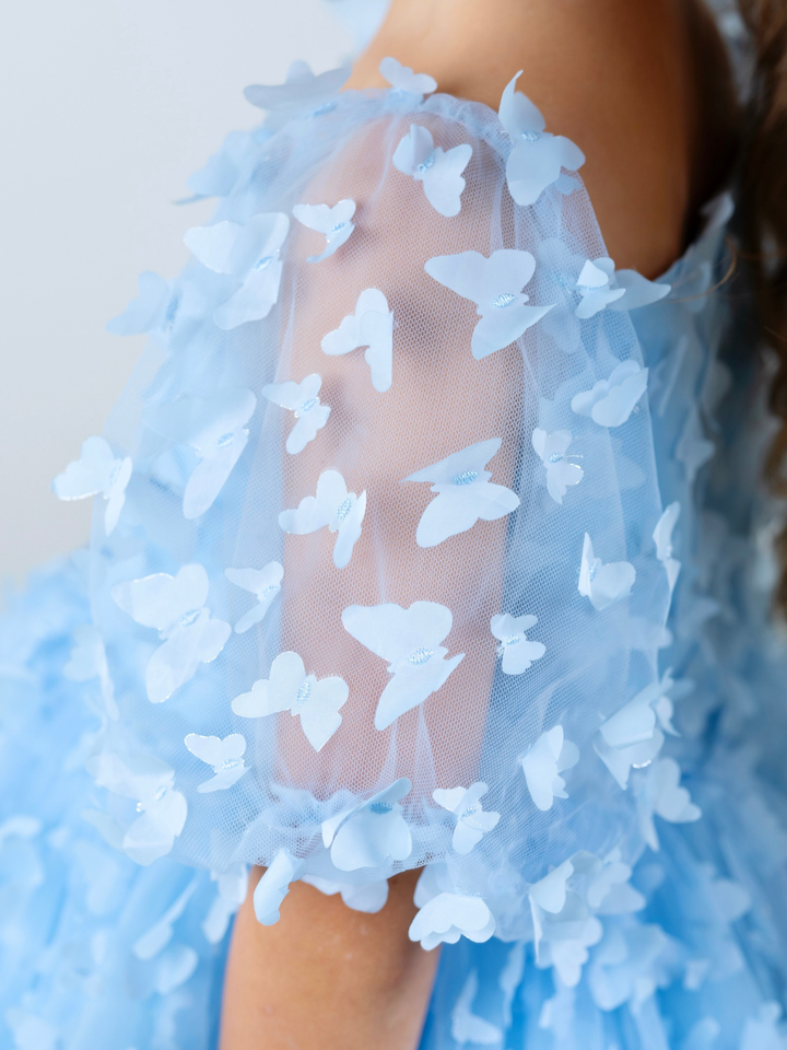 3D butterfly appliqué detail on girls formal party dress