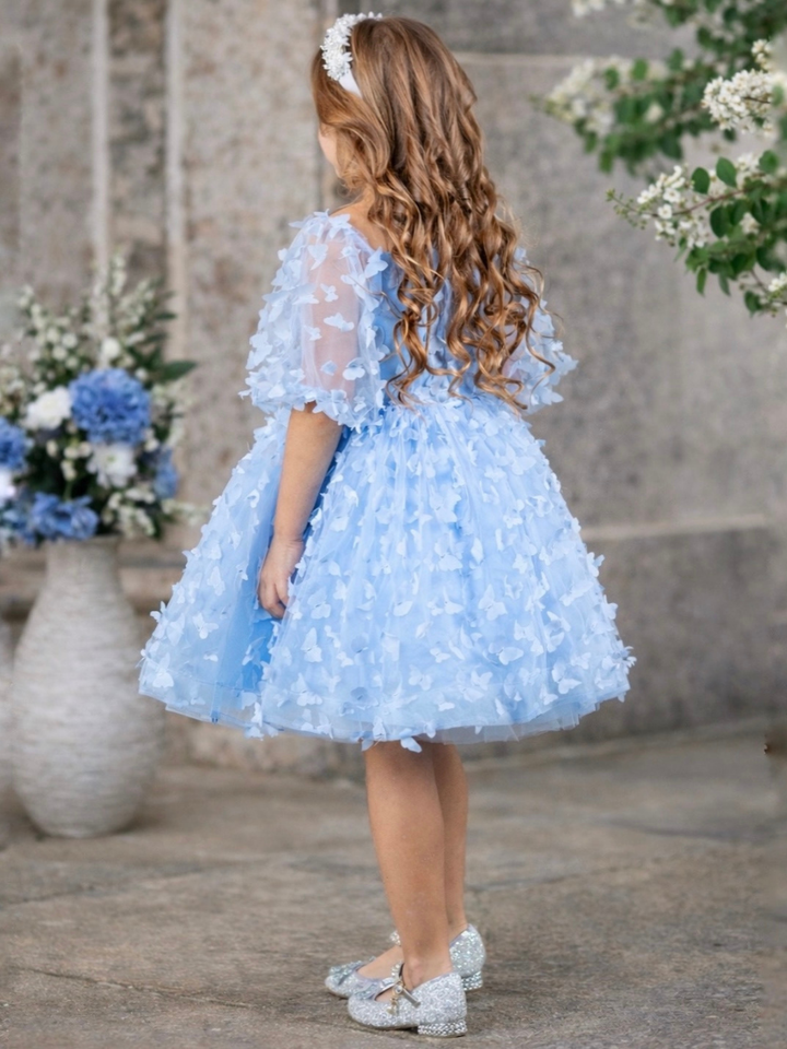 Blue party dress for girls with butterfly appliqué details
