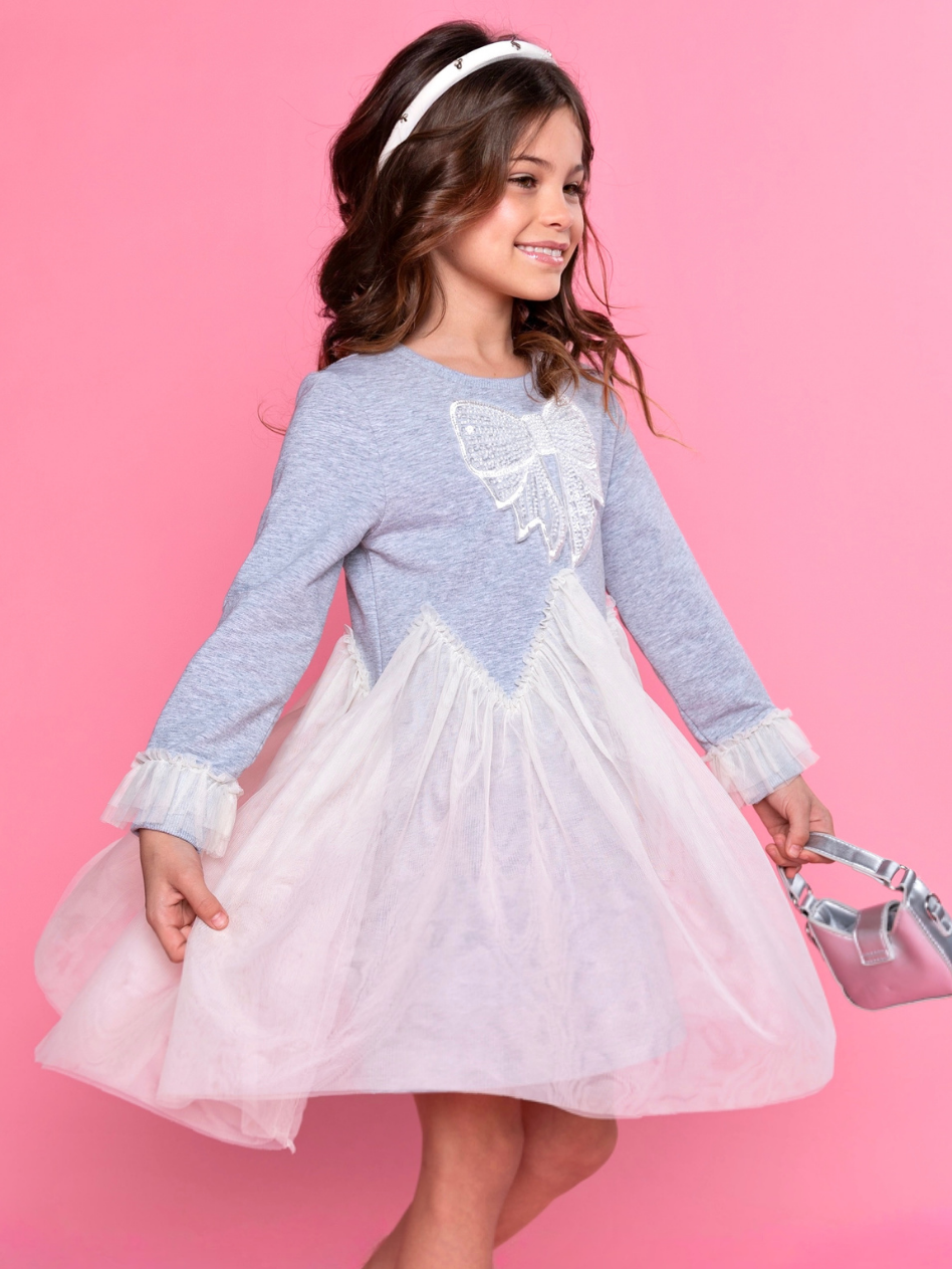 Flowing tulle skirt movement on girls party dress