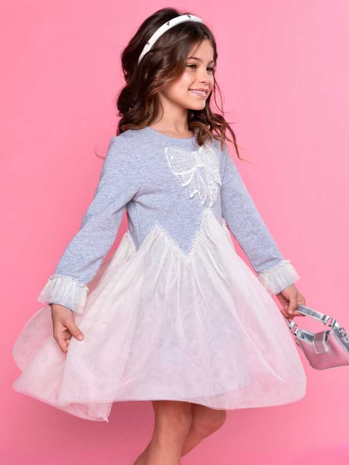 Flowing tulle skirt movement on girls party dress