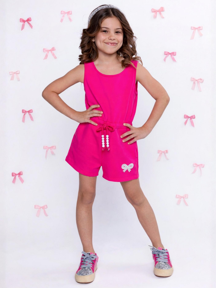 Girls casual pink romper with elastic waist and bow detail