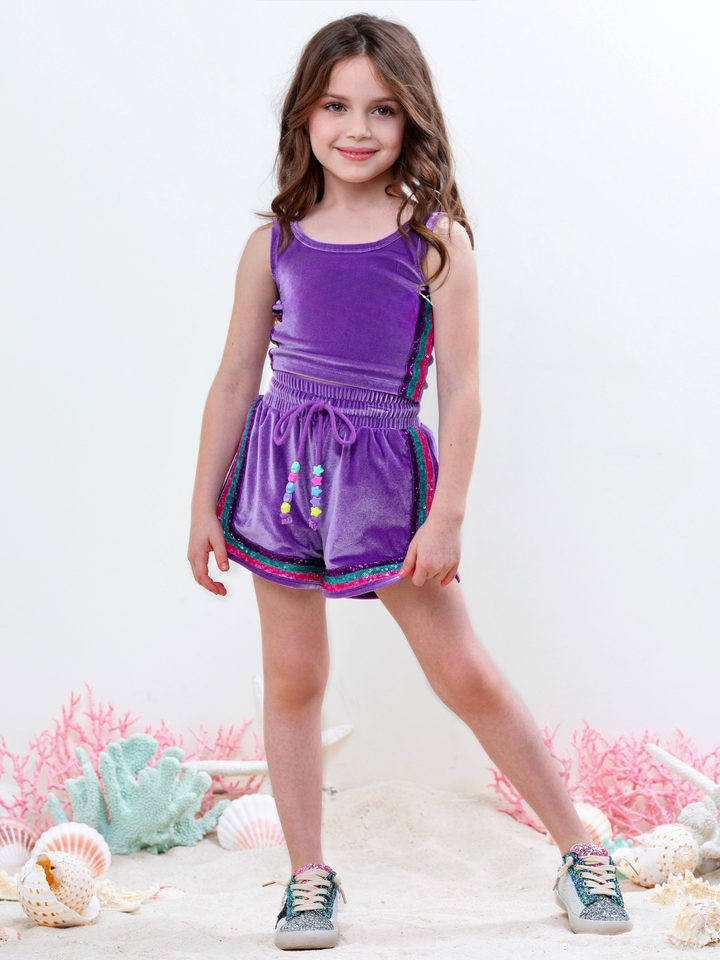 Little girl in mermaid summer outfit with glitter stripe shorts set