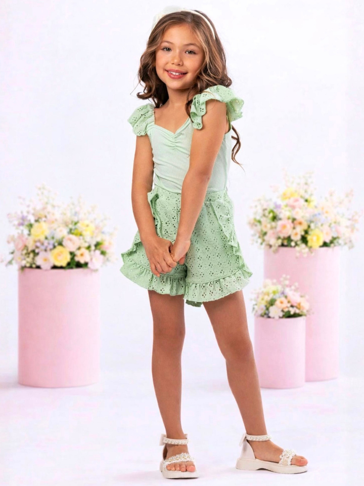 Stylish girls sage green outfit with ruffle sleeves and embroidered eyelet shorts