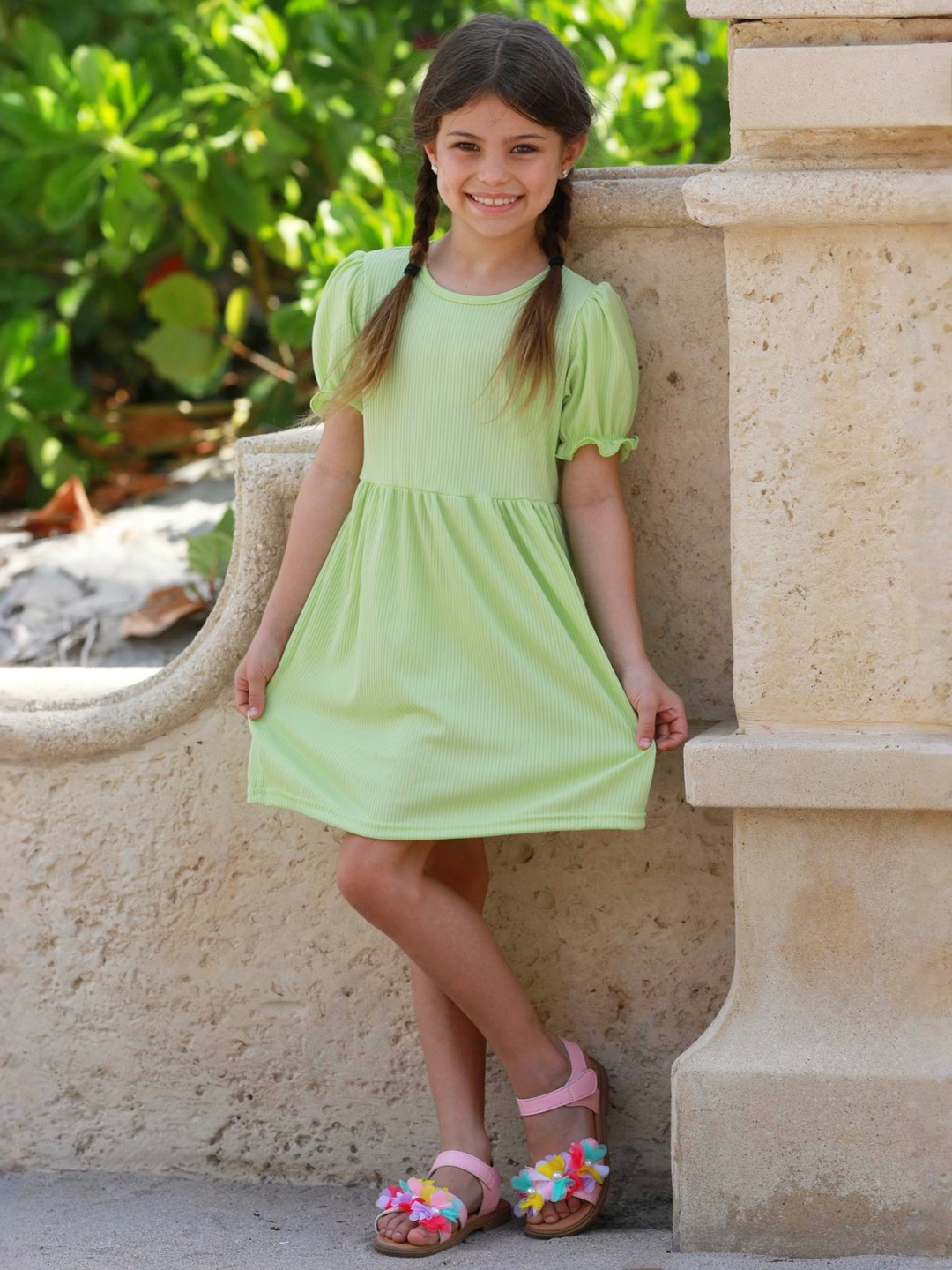 girl wearing lime green summer dress with puff sleeves casual outfit