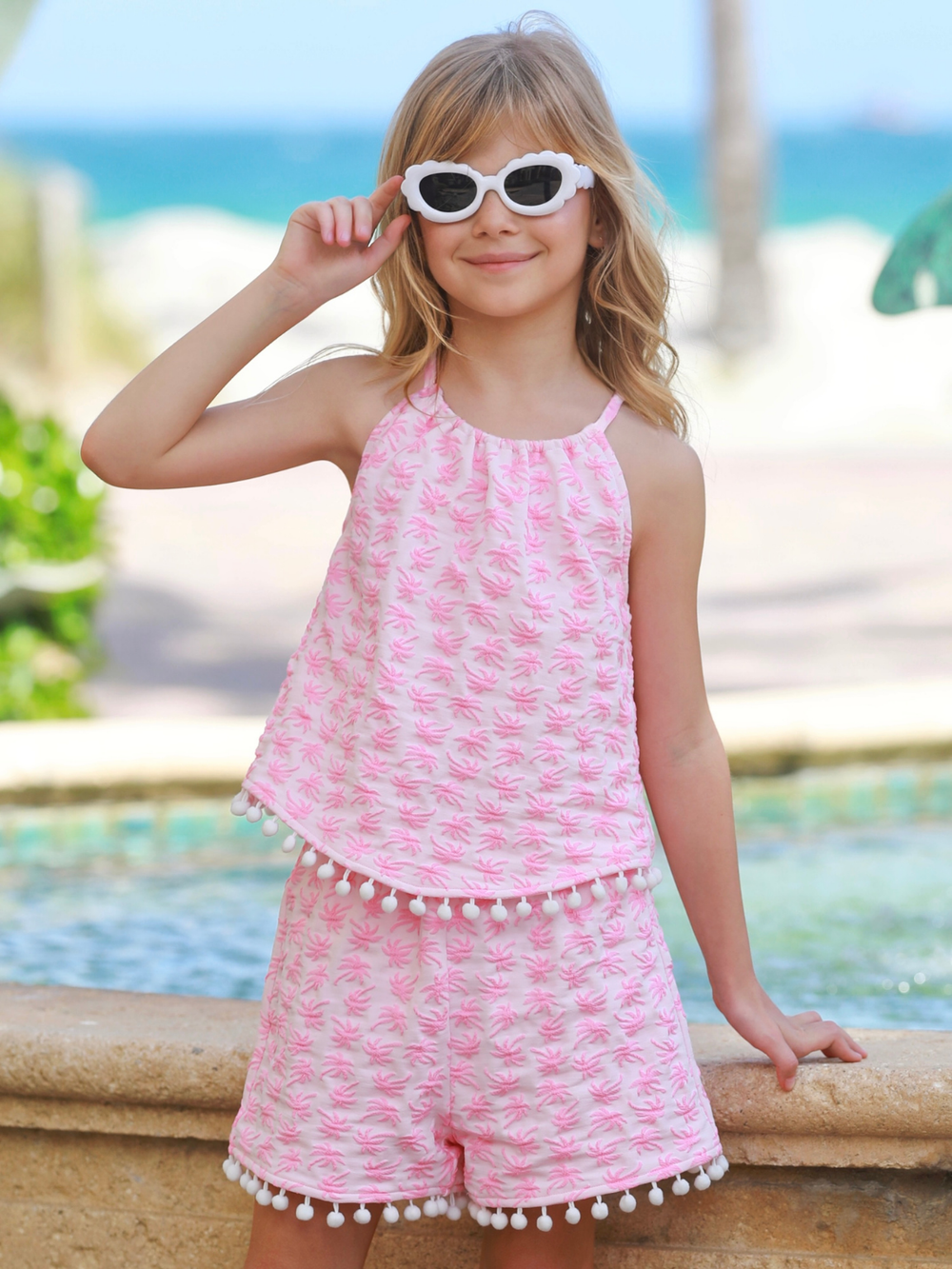 kids pink vacation outfit tank and shorts set with pom detail
