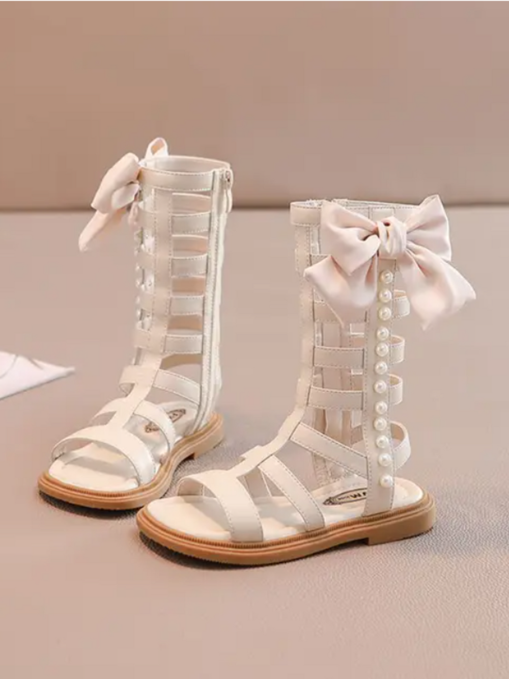 Bow-Embellished Pearl Gladiator Sandals By Liv and Mia Mia Belle Girls