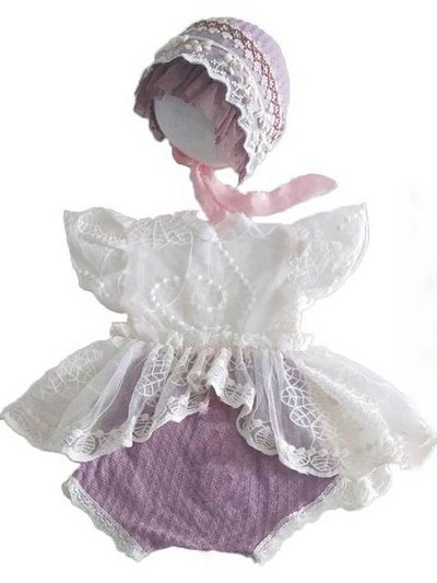 Baby set features a skirted onesie with a lace bodice and a matching cap lilac