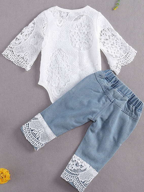 Baby set features a kimono lace onesie with distressed jeans with lacey hem
