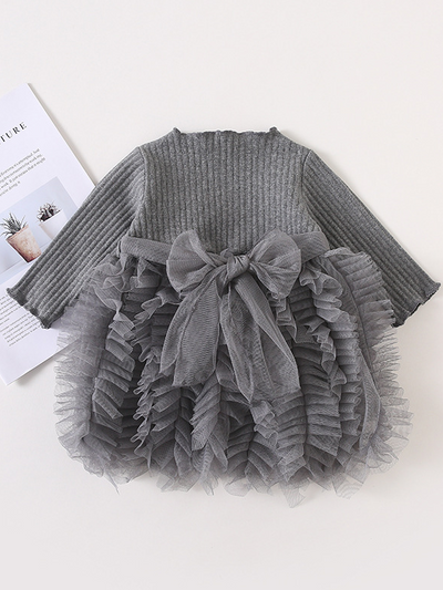 Baby Spring sweater dress features long sleeves with a ruffled tulle skirt and front bow