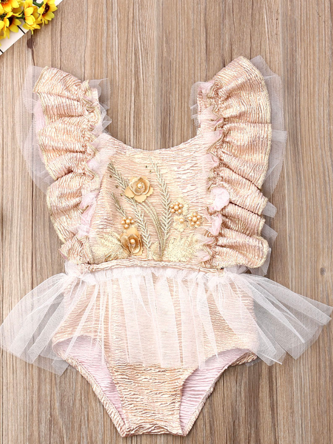 Baby ruffled tutu onesie has a cute flower applique and is a pullover style dusty pink