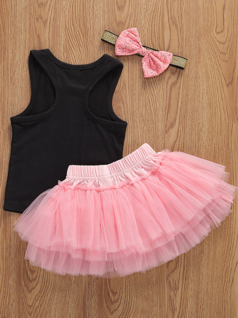 Baby set features a black top with a gold "One" print and a pink tutu skirt with a sequin bow at the waist. Comes with a matching sequin headband