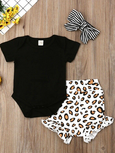 Baby set features a onesie with high waisted leopard printed bloomers and a matching headband