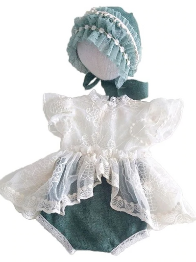Baby set features a skirted onesie with a lace bodice and a matching cap green