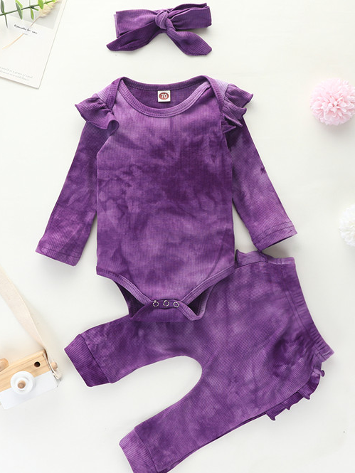 Baby set features a tie-dye long-sleeved onesie with ruffled shoulders, ruffled leggings, and matching headbands