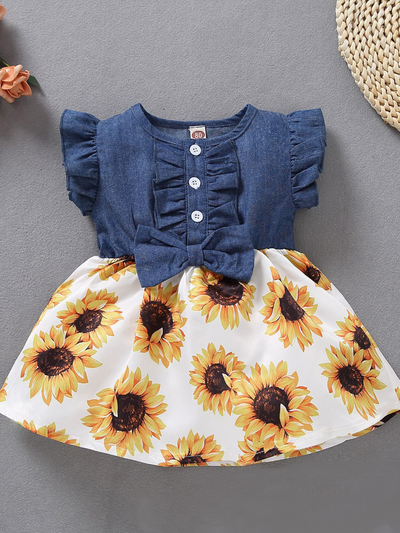 Baby Spring apron style dress has a denim bodice and floral skirt Yellow sunflower front button