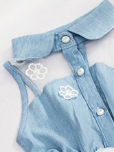 Baby tutu dress has a denim and mesh bodice with front button closure and a tutu skirt with flower applique
