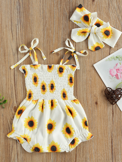 Baby sunflower printed onesie with a stretchy bodice with adjustable shoulder straps with matching headband 
