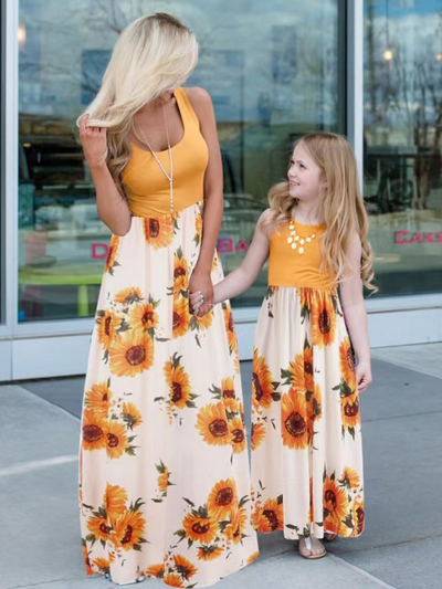 Mommy and me sleeveless maxi dress with yellow tank top bodice and sunflower print skirt - Mia Belle Girls