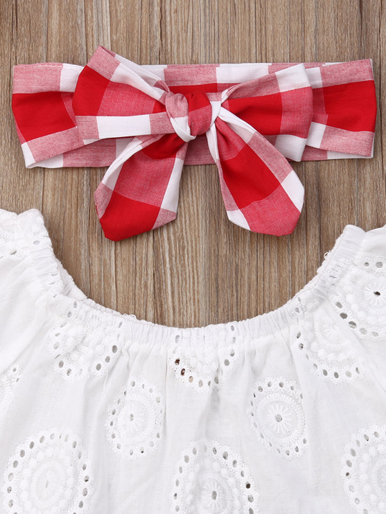 Baby set features an eyelet off-shoulder top and checkered skirted bloomers with a headband