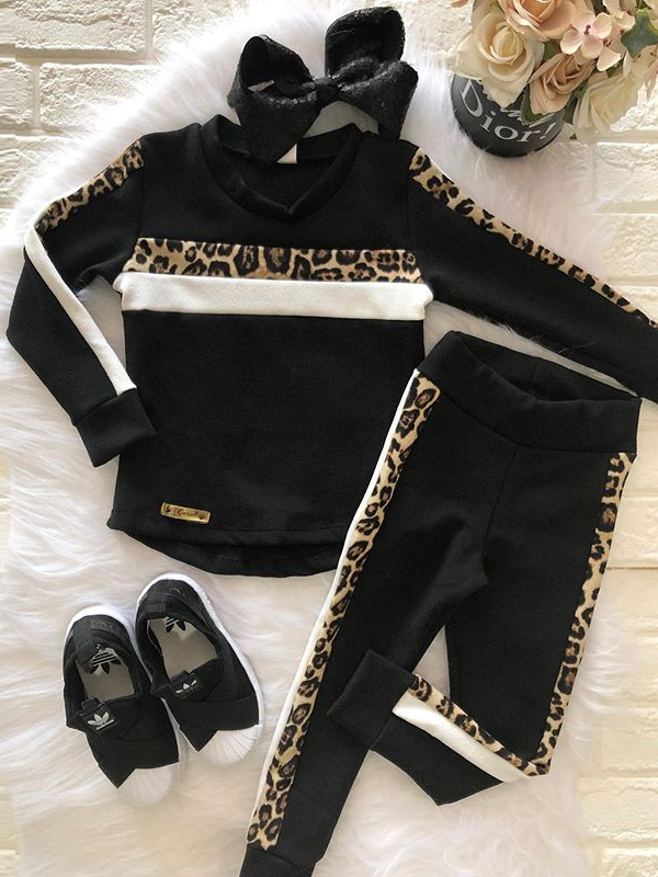 Girls Set features a striped sweater with leopard details and matching jogger pants 