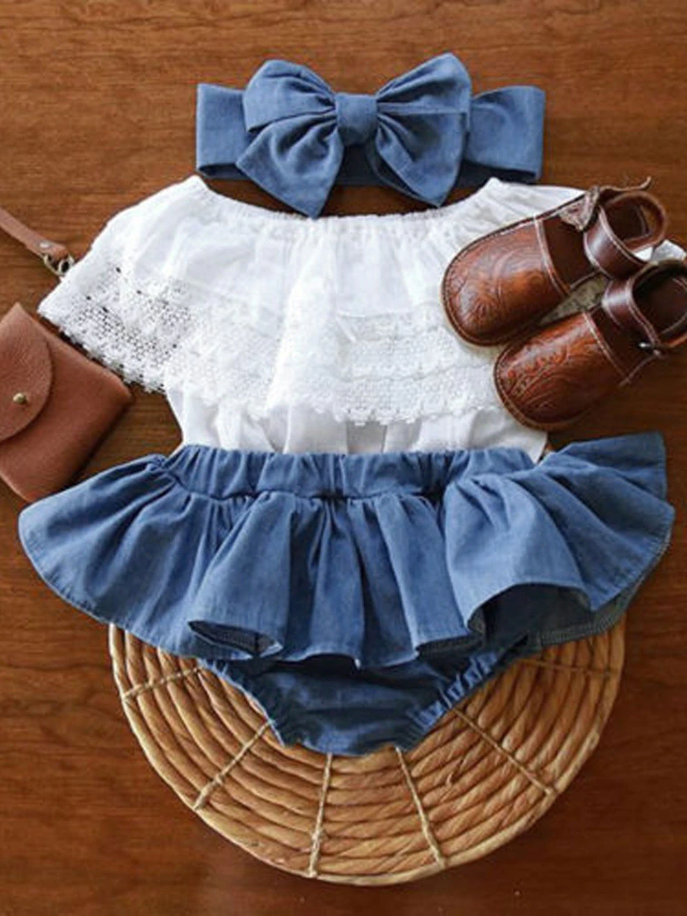 Baby set features a ruffled top with crocheted bib and denim skirted bloomers with a headband