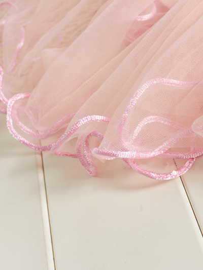 Baby Spring dress has an embroidered bodice, applique flowers at the waistline, and a hi-lo tulle skirt