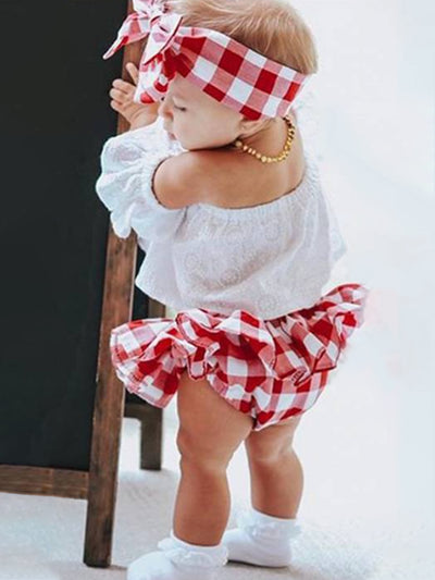 Baby set features an eyelet off-shoulder top and checkered skirted bloomers with a headband