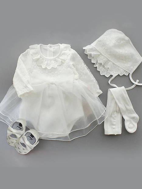 Baby set features a onesie with a tulle skirt, matching shoes, and cap