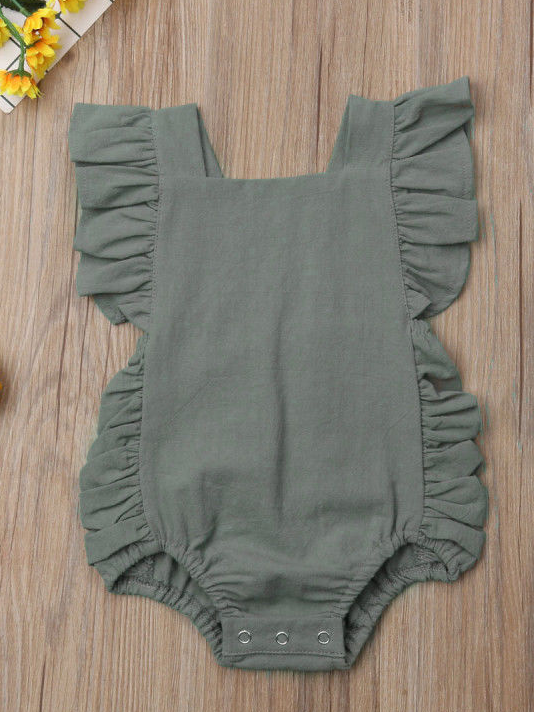 Baby onesie has cute little shoulder ruffles and ruffles on the side. Overall style with strap closure at the back Green
