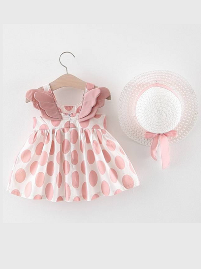 Baby dress has an adorable polka dot print and little angel wings at the back and comes with a matching hat Pink
