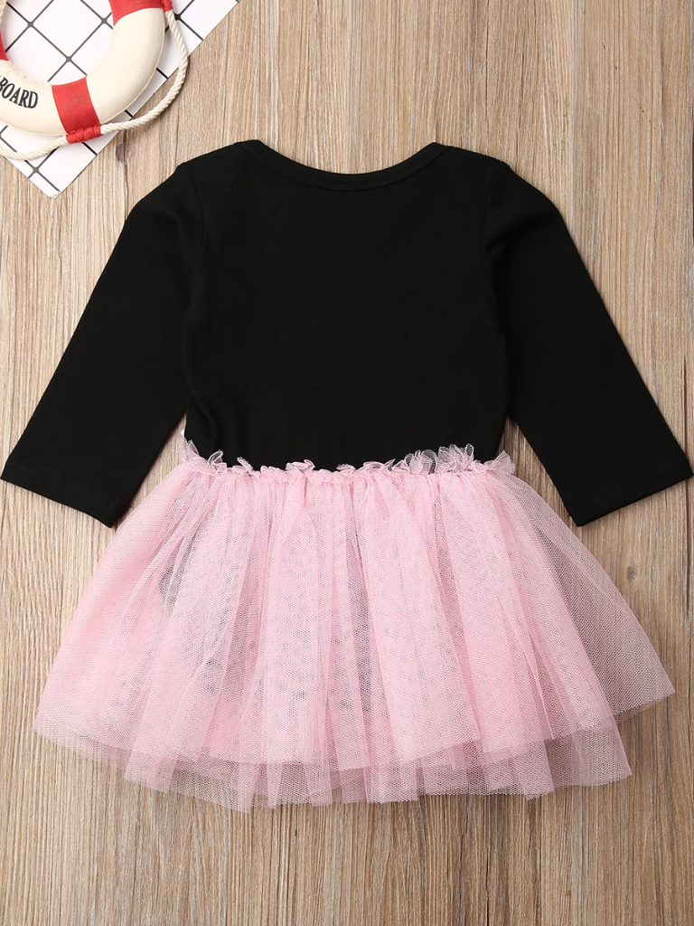 tutu dress has a long sleeved black bodice with "My Little Black Dress" in rhinestones and a tutu skirt