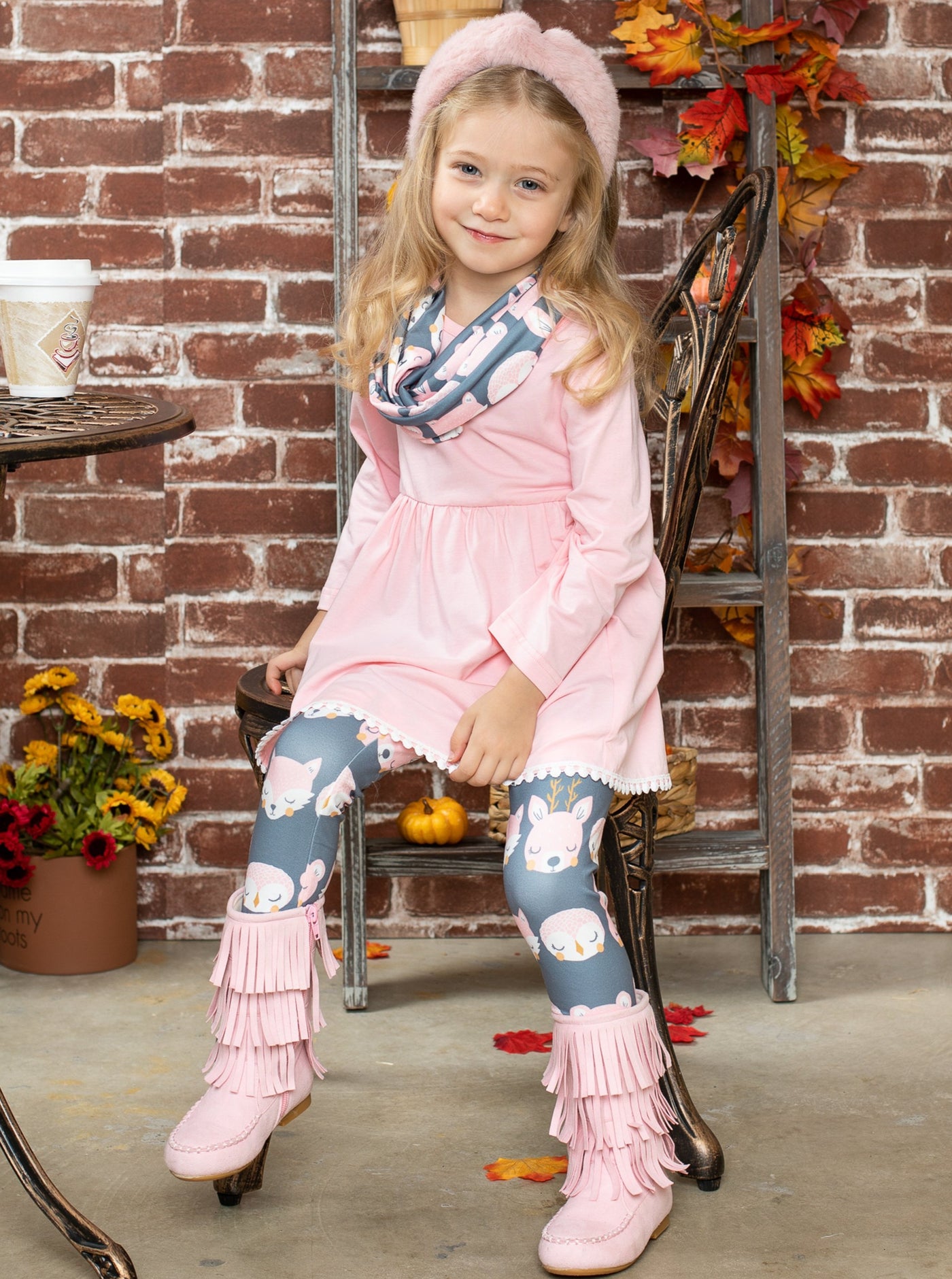 Girls Set features a pink tunic with pompom hem and leggings with forest animal print and a matching scarf