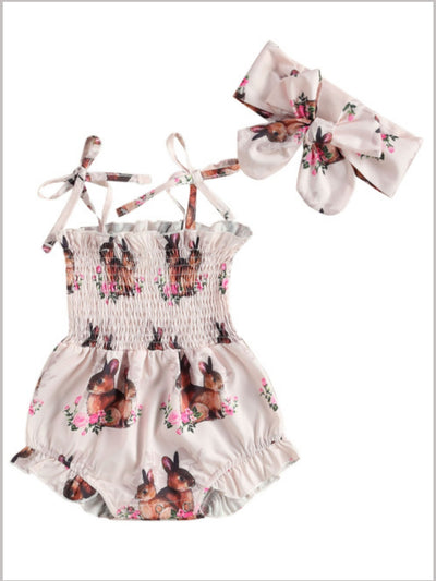 Baby pink onesie with bunny prints and a stretchy bodice with adjustable shoulder straps with a matching headband