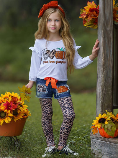 Girls Set features a ruffled top with Peace, Love, and Pumpkin print and patched denim shorts with an orange sash and leopard leggings