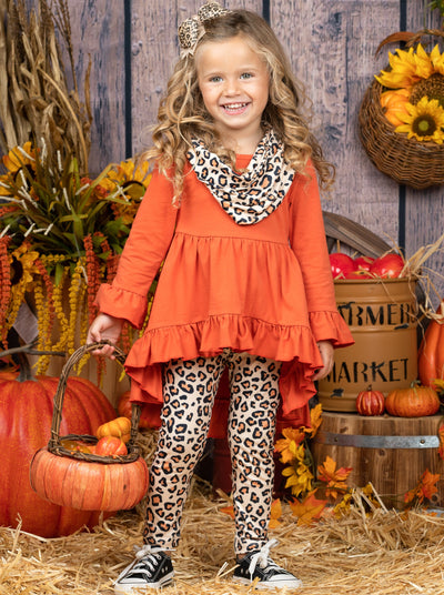 Girls Set features a hi-lo ruffled tunic with leopard print leggings and a matching scarf