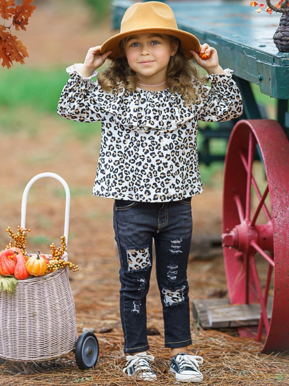 Girls set features a double ruffle neckline bib, animal printed top and patched jeans