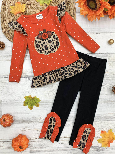 Little girls Fall long-sleeve polka dot tunic with leopard print pumpkin applique, leopard ruffle accents on shoulder and hem, and black leggings with matching ruffle button ankle accents - Mia Belle Girls