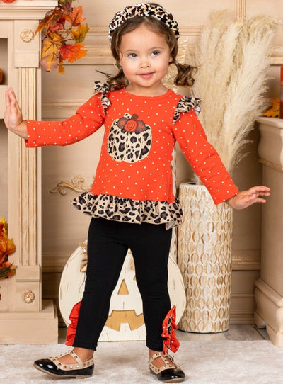 Little girls Fall long-sleeve polka dot tunic with leopard print pumpkin applique, leopard ruffle accents on shoulder and hem, and black leggings with matching ruffle button ankle accents - Mia Belle Girls