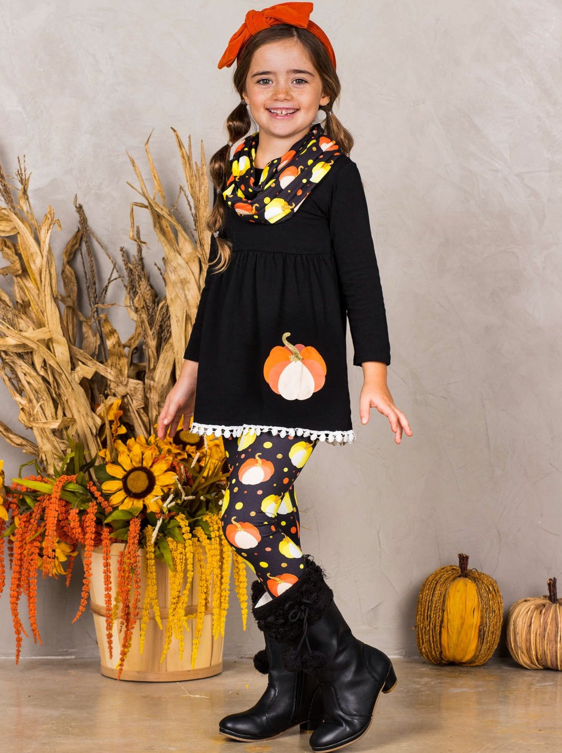 Little girls long-sleeve tunic with pom-pom hem, pumpkin print graphic, and matching leggings and infinity wrap scarf - Mia Belle Girls
