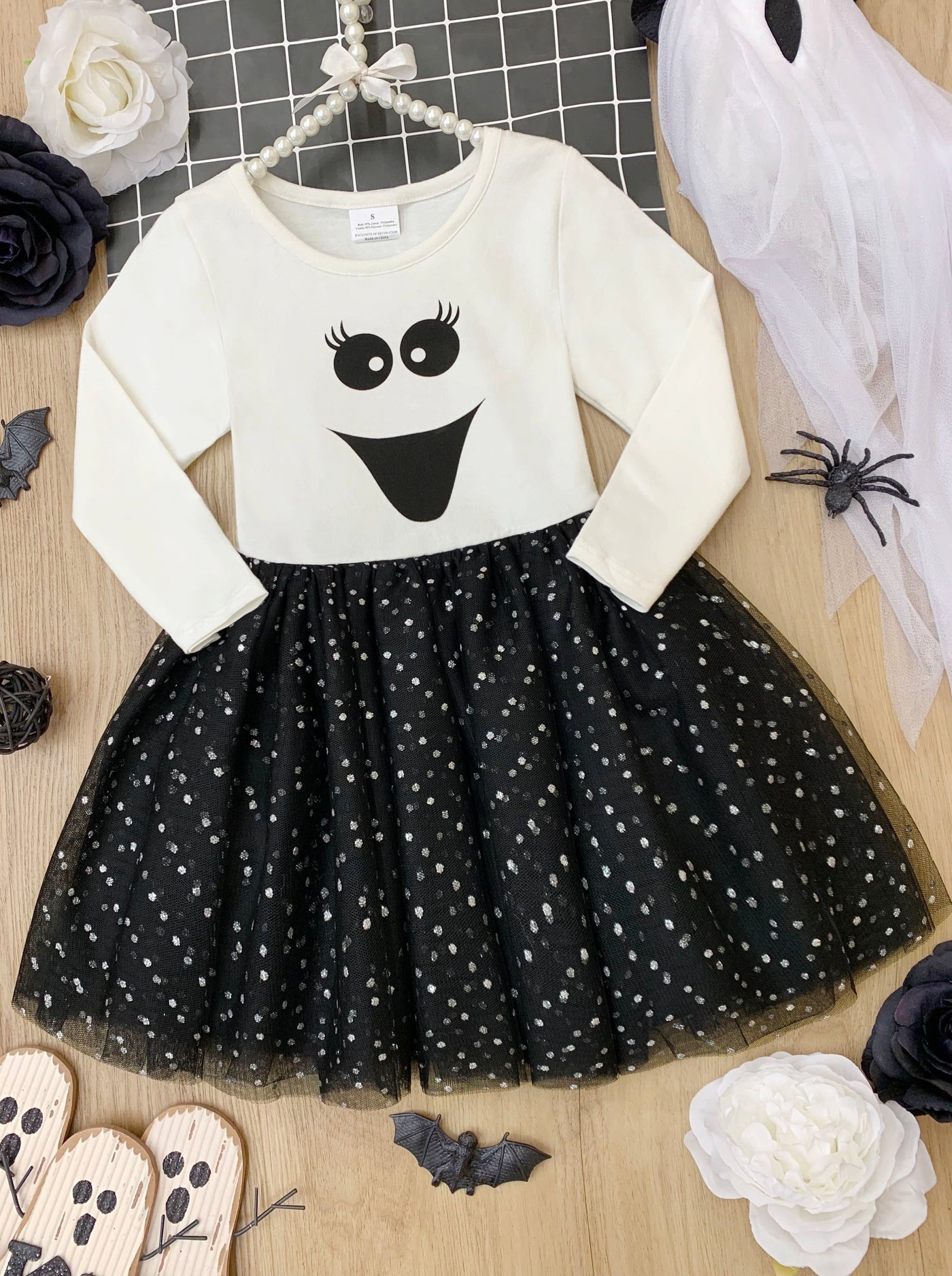 Girls Halloween apparel long-sleeve tutu dress with happy ghost face graphic bodice and a sparkly glitter gathered tulle skirt - Mia Belle Girls