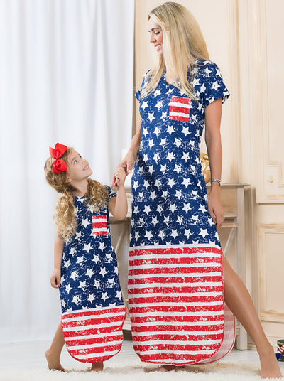 Mommy and me navy maxi dress features white stars and a red/white striped hem