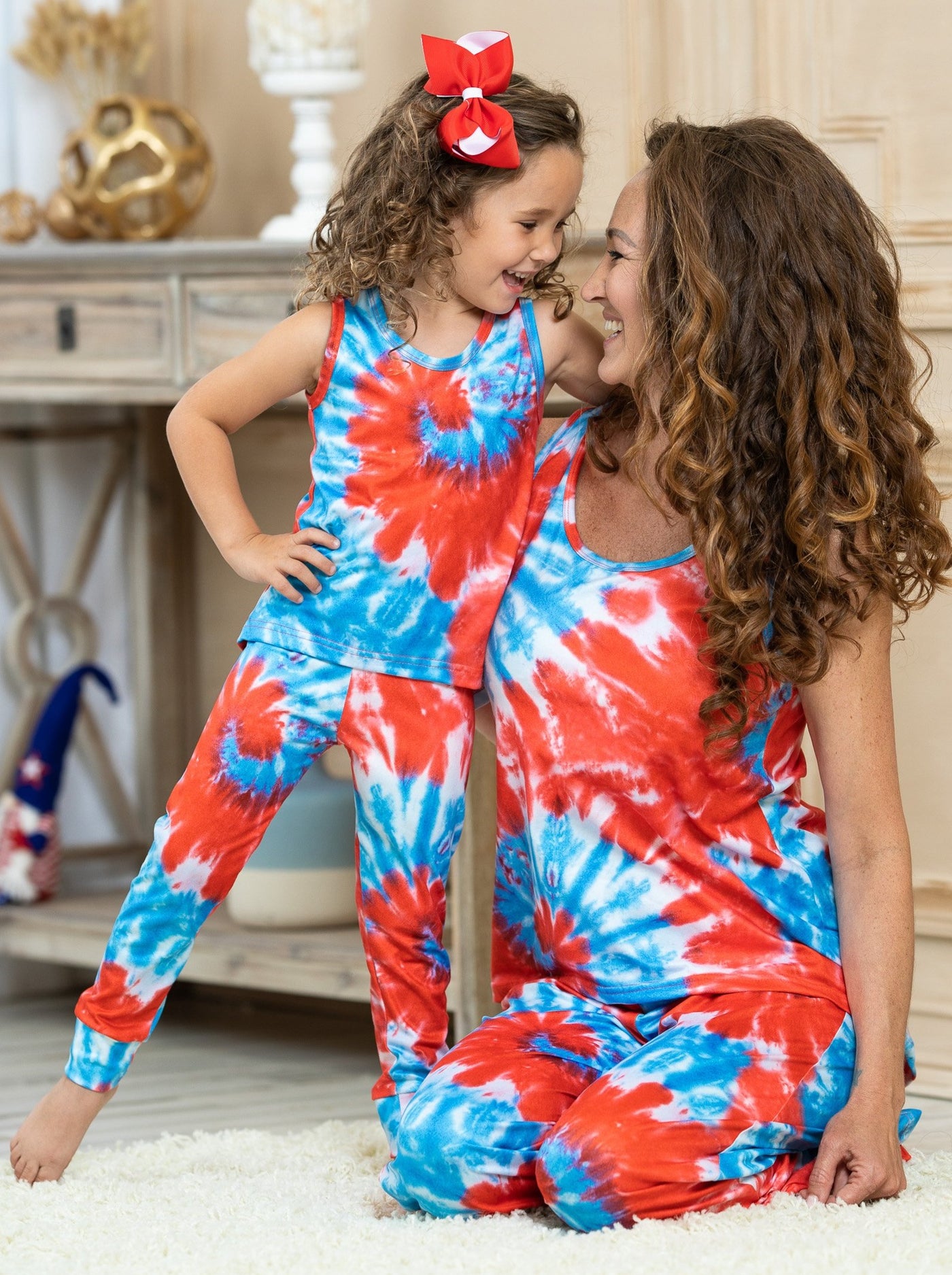 Mommy and Me blue tie-dye pajamas feature a tank-style top and loose fit bottoms