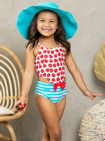 One-piece open-side swimsuit with strawberry print top and striped print bottoms and a red bow - Girls One-Piece Swimsuit