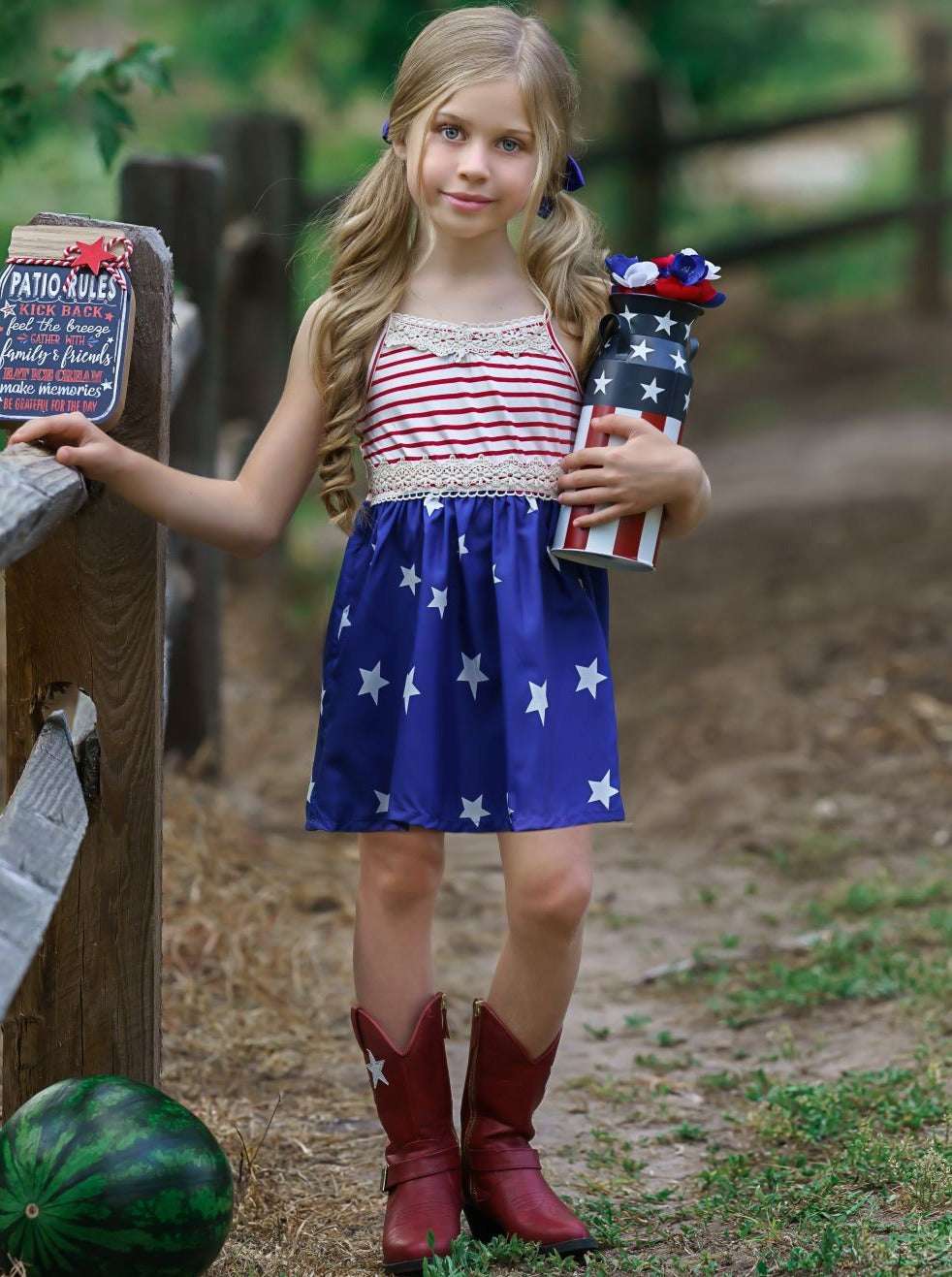 Girls 4th of July dress features a sleeveless red/white striped bodice with crochet details and blue/white star print skirt 2T-10Y for toddlers and girls