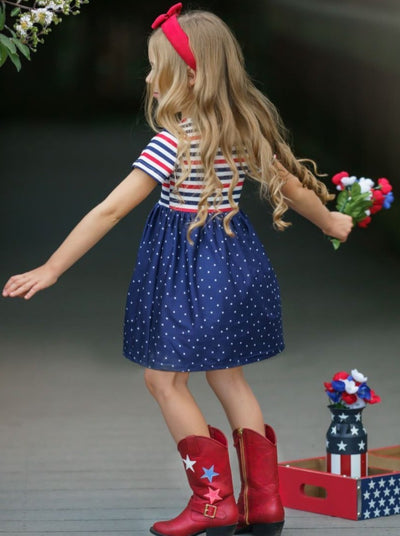Girls dress features a red/white/blue striped bodice and a red sequin star and blue/white starred skirt