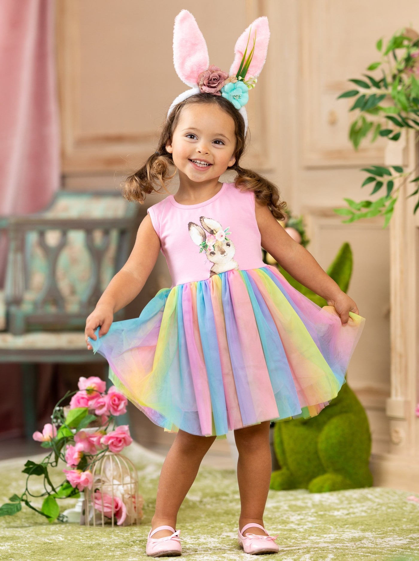 Easter tutu dress with a pink sleeveless bodice with bunny graphic and a rainbow tulle skirt 2T-10Y